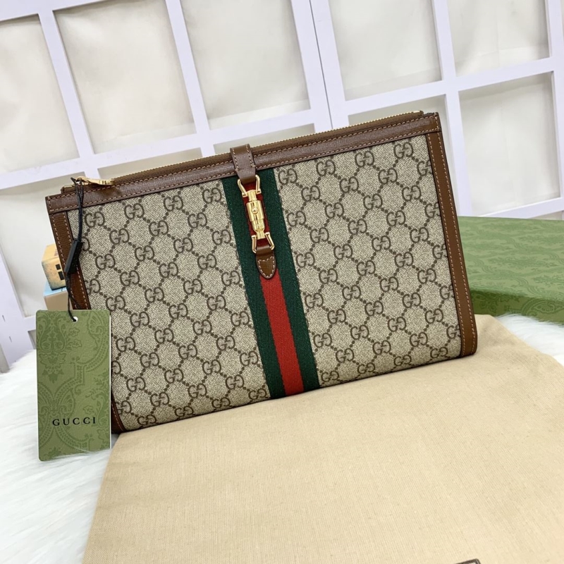 G*u*i clutch bags